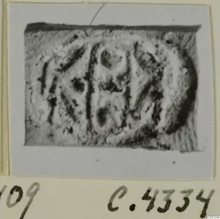 Glyptic find from Ayia Irini: a small rectangular seal or gem with an engraved design, photographed close up