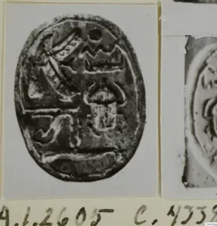 Oval stone seal with an engraved design, from Ayia Irini, shown on a pale mount.