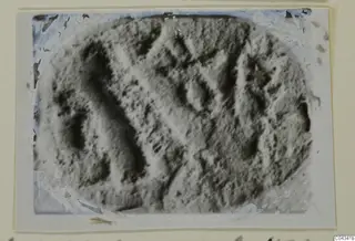 Oval seal or gem with incised diagonal lines, from Ayia Irini
