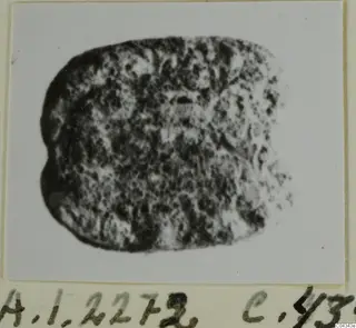 Glyptic find from Ayia Irini: a small rounded-rectangular stone seal or gem with a mottled surface