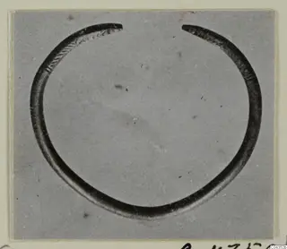 Silver open ring or bracelet with incised decoration at its two ends
