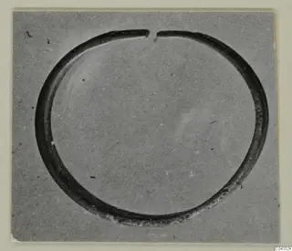 Silver ring with a small gap at the top
