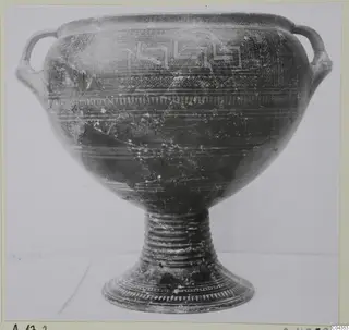Pottery Special Wares: a footed vessel with two loop handles and bands of decoration around the body
