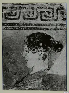 Close view of a painted profile head with dark hair, below a band of key pattern, pottery White Grounded Ware