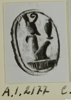 Oval seal or gem with an engraved design, photographed on a pale mount