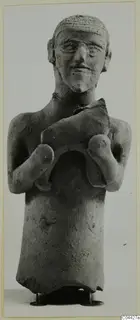 Terracotta figurine of a standing human figure holding a curved object across its chest