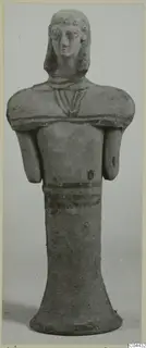 Terracotta figurine of a standing figure with painted bands, from Ayia Irini