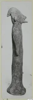 Terracotta figurine with a beak-like head on a tall, slender body, from Ayia Irini