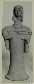 Terracotta figurine of a standing figure with painted bands at the neck and shoulders