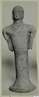 Terracotta figurine of a standing figure with bent arms and a chevron pattern across the chest