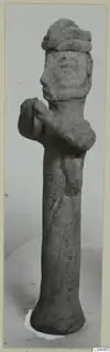 Terracotta figurine of a standing figure with hands raised to the chest, from Ayia Irini