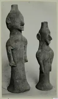 Two terracotta figurines of standing figures with cylindrical tops and flared bases, Terracotta Minor Plastic 3