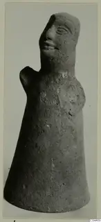 Terracotta figurine with a bell-shaped body and a face with eye, nose and mouth, from Ayia Irini