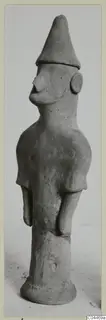 Terracotta figurine of a standing human figure with a tall conical head covering, from Ayia Irini