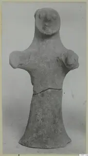 Terracotta figurine from Ayia Irini with a rounded head, stub arms and a flared base