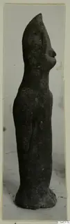 Terracotta figurine of a standing figure in side view, from Ayia Irini