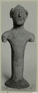 Terracotta figurine of a standing human figure with a cylindrical body and broken-off arms, from Ayia Irini