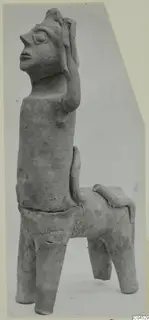 Terracotta figurine of a figure with a human-like head and a four-legged animal body, from Ayia Irini