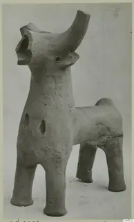 Terracotta figure of a four-legged animal with a tall curved tube rising from its head