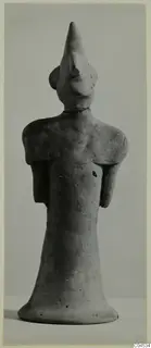 Terracotta figurine of a standing figure with a tall pointed head, from Ayia Irini