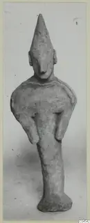Terracotta figurine of a standing figure with a tall pointed head and bent arms