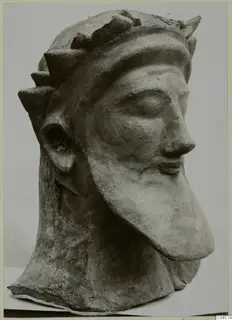 Bearded head sculpture from Mersinaki with a spiked headdress, shown in three-quarter view.