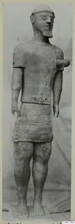 Standing terracotta statue of a bearded male figure, Terracotta Proto-Cypriote I, from Ayia Irini