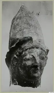 Head of a figure in a tall pointed headdress, from Mersinaki