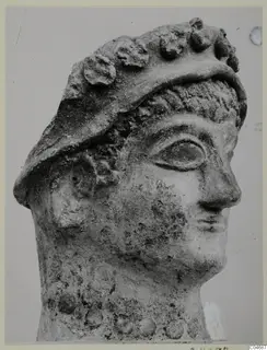 Head of a sculpture from Mersinaki, with a broad band of rounded knobs across the top of the head