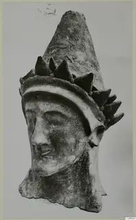 Head of a figure with a tall conical headdress, from Mersinaki