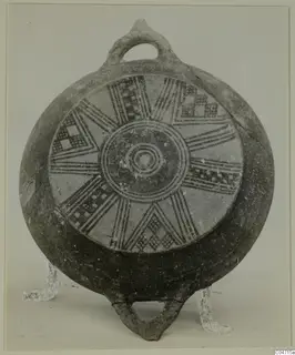Pottery Black Slip Bichrome vessel with radiating bands and checkerboard panels, with loop handles, from Amathus tombs