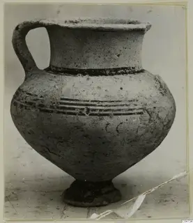 Pottery vessel with a single handle and dark painted bands, from Amathus tombs