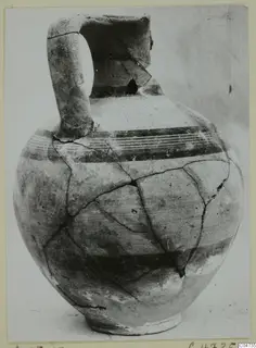 White Painted I jug from Amathus with a strap handle and dark painted bands around the body