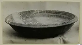 Pottery Bichrome IV plate-jug from Amathus tombs 1–9, shown in three-quarter view on a plain surface