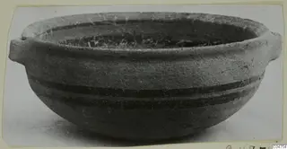 Pottery White Painted IV bowl with two small horizontal handles and two dark painted bands around the body