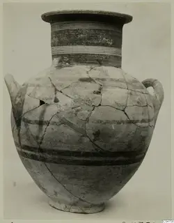 Pottery jar, White Painted III-1, with two handles and dark painted bands, pieced together from fragments