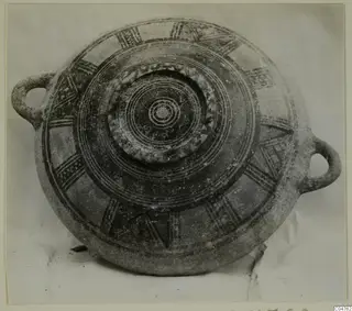 Pottery Bichrome III vessel from Amathus with two loop handles and radiating painted bands