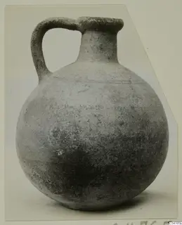 Pottery Plain White IV-V jug with a strap handle and a rounded body, from Amathus tombs