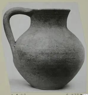 Pottery Plain White IV-V jug with a single loop handle, from Amathus, shown on a photo card