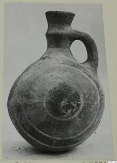 Round-bodied jug with a single loop handle and concentric bands on its body, from Amathus.