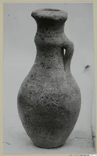 Jug of Pottery Bichrome IV from Amathus, with a flared rim and one strap handle