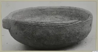 Pottery Plain White IV-V: a bowl with a handle, shown from the side, from Amathus