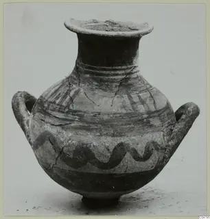 White Painted I amphora from Amathus with two handles, dark painted bands and a wavy line on a light body