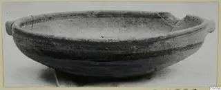 Pottery Bichrome IV plate-jug from Amathus: a shallow bowl with two small handles and dark painted bands