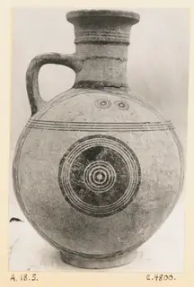 Pottery Bichrome III jug from Amathus, with painted bands and concentric circles on its body