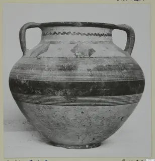 Two-handled painted jar, Bichrome III, with banded decoration and a wavy line below the rim