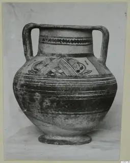 Two-handled painted pottery amphora-crater, photographed against a plain backdrop