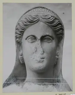 Stone statue head of a woman from Arsos, front view