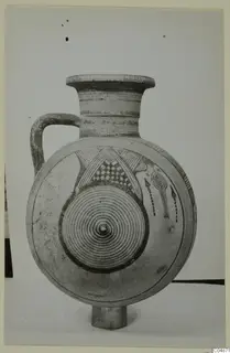 Jug from Pottery Bichrome IV with concentric circles and a checkered panel painted on its body
