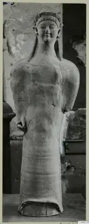 Terracotta Cypro-Greek I standing figure from Mersinaki I-II, with a headdress and cylindrical lower body